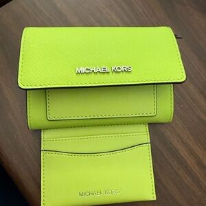 Michael Kors 2-in-1 wallet.  Like new condition, used one week.